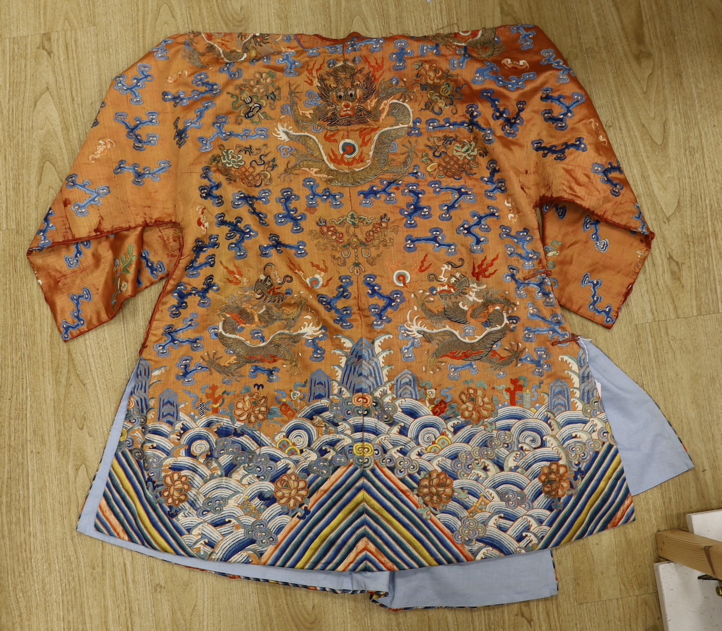 A Chinese embroidered silk dragon robe, late Qing Dynasty